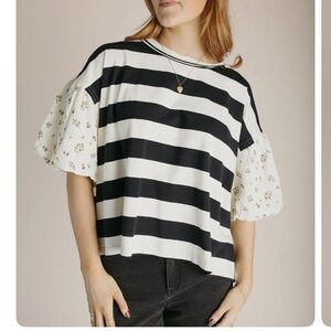 Elegant Black and White Striped Blouse with Floral Sleeves